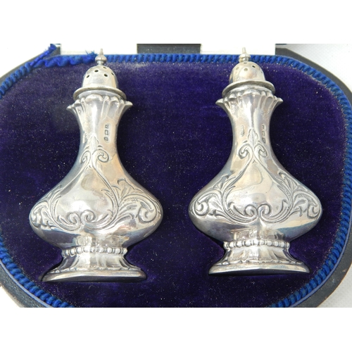 739 - A Pair of Edwardian Silver Pepperettes Hallmarked Birmingham 1907 in Original Fitted Case.