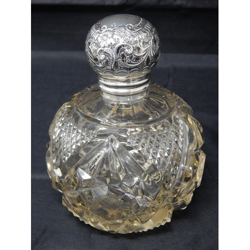 776 - Large Silver Topped Cut Glass Perfume Bottle with Original Inner Stopper: Hallmarked Chester 1910 by... 