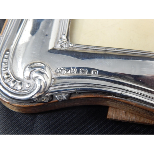 777 - Silver Photograph Frame Hallmarked Birmingham 1911 by Henry Matthews: Measuring 20cm high x 14cm wid... 