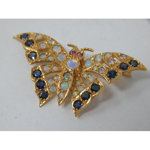 838 - 9ct Yellow Gold Butterfly Brooch Set with Sapphires & Opals: Width 4cm: Gross weight 4.97g