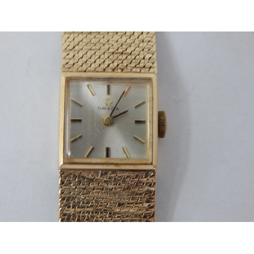 840 - Ladies 9ct Yellow Gold Omega Wristwatch: Gross weight 31.75g