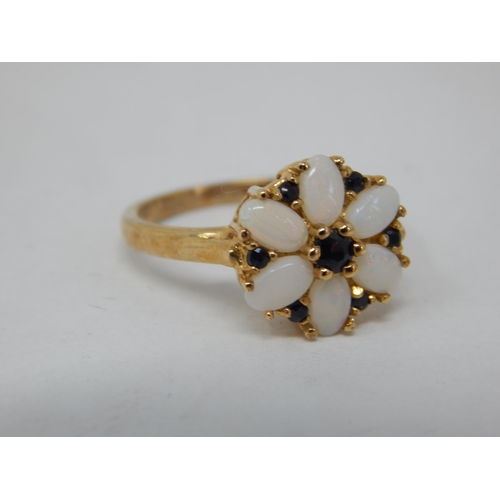 843 - 9ct Yellow Gold Gem Set Ring: Size O: Gross weight 3.38g