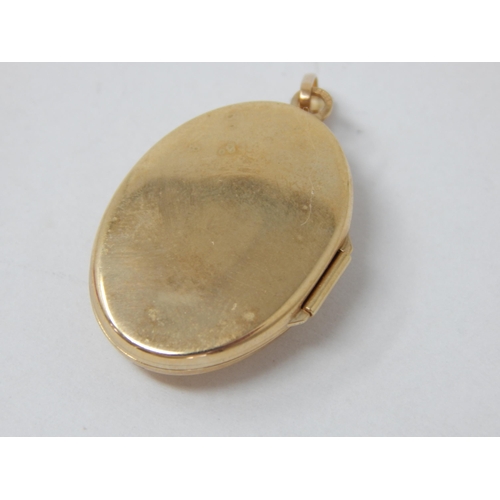 865 - 9ct Yellow Gold Gem Set Locket with Suspension Loop: 2.5cm: Gross weight 3.82g