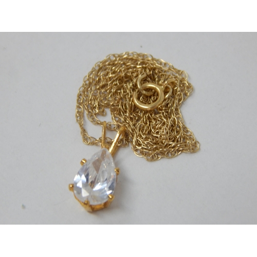 869 - 9ct Gem Set Pendant on 9ct Yellow Gold Chain (45cm) Gross weight 1.56g