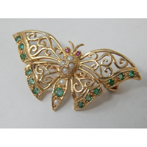 883 - 9ct Yellow Gold Gem Set Butterfly Brooch: Width 4cm: Gross weight 4.58g