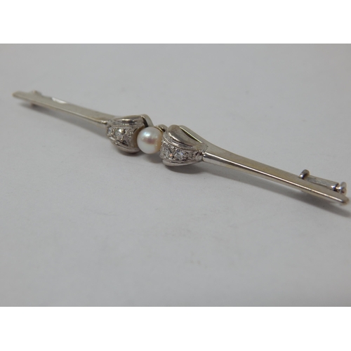 886 - 14ct White Gold Diamond & Pearl Set Brooch: Width 6.5cm: Gross weight 3.61g