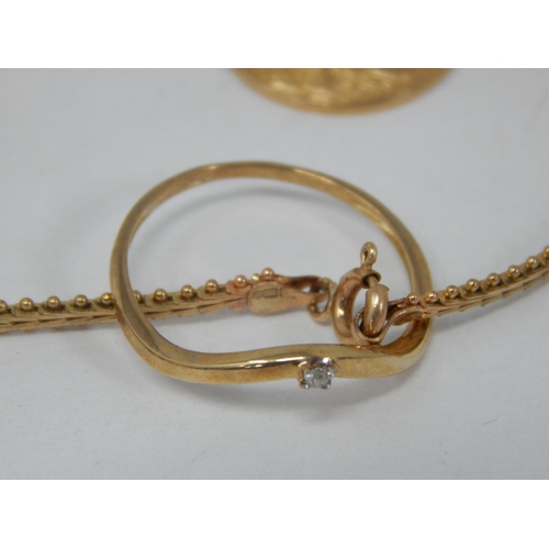 892 - 9ct Yellow Gold Bracelet with attached 9ct Ring & 9ct St Christopher: Weight 5.62g