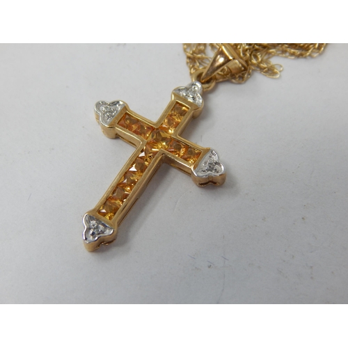 895 - 9ct Yellow Gold Gem Set Cross on 9ct Gold Chain: Gross weight 2.27g