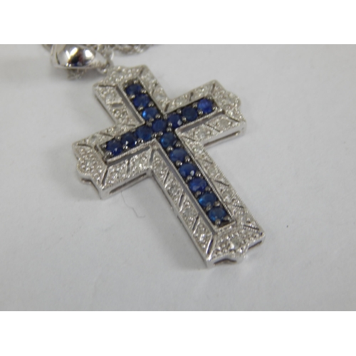 902 - 9ct White Gold Gem Set Cross on 9ct Gold Chain: Gross weight 2.88g