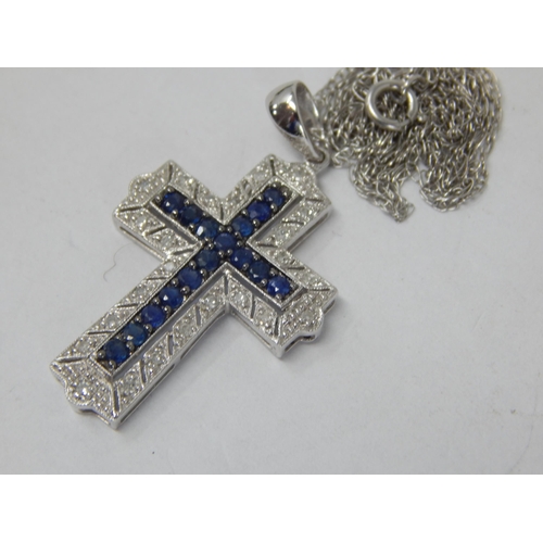 902 - 9ct White Gold Gem Set Cross on 9ct Gold Chain: Gross weight 2.88g