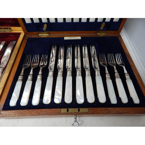 802 - Two Mahogany Canteens of Silver Plated Flatware with Mother of Pearl Handles