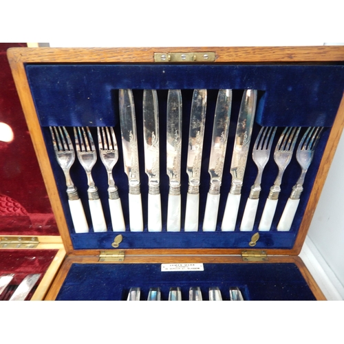 802 - Two Mahogany Canteens of Silver Plated Flatware with Mother of Pearl Handles