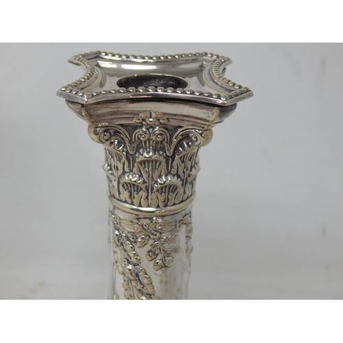 804 - A Pair of Edwardian Silver Plated Candlesticks with removeable Sconces: Height 22cm