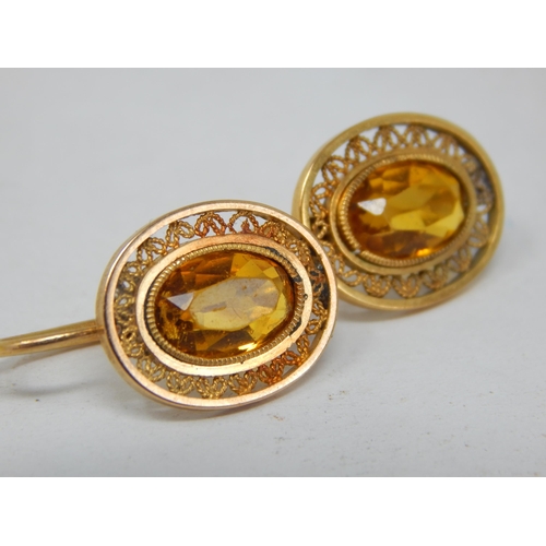 935 - A Pair of Antique Unmarked Gold Citrine Set Earrings: Gross weight 4.21g