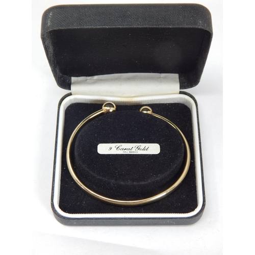 987 - 9ct Yellow Gold Torque Bangle in Original Fitted Case: Weight 5.8g