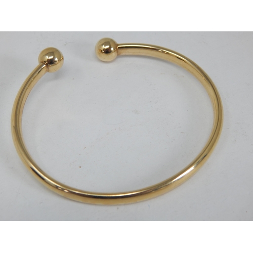 987 - 9ct Yellow Gold Torque Bangle in Original Fitted Case: Weight 5.8g