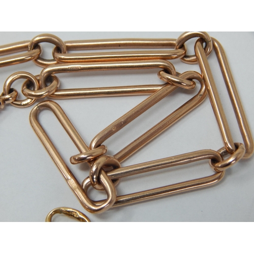 100 - 9ct Gold Albert Chain with T-Bar, Clips & Key: Gross weight 56.9g