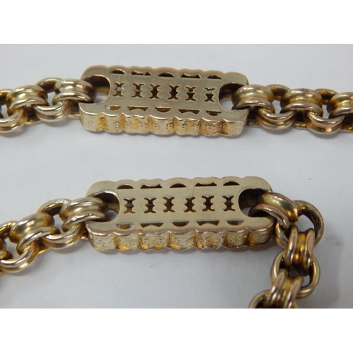 119 - 9ct Yellow Gold Fancy Link Albert Chain with Clip: Length 36.5cm: Weight 35.27g