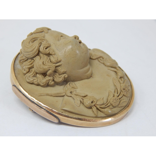 128 - 19th Century Gold Framed Lava Cameo Carved in Relief: 4cm x 3.2cm