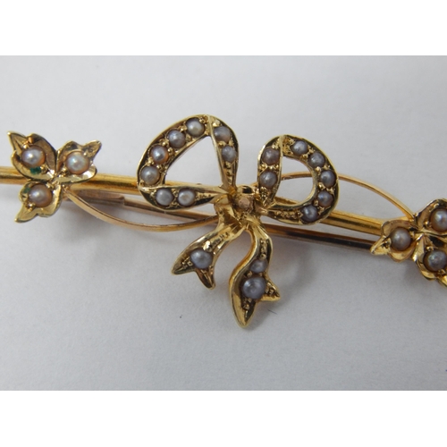 130 - 15ct Gold Bow Brooch Set with Seed Pearls: 3.6cm: Weight 2.12g