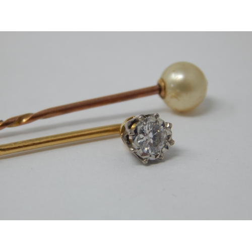 133 - Unmarked Gold Stick Pin Set with a Diamond together with a Gold Stick Pin Set with a Pearl