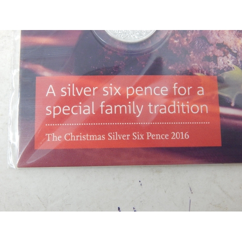 80 - Royal Mint 2016 The Christmas Silver Sixpence in Pack of Issue together with a London Mint 2019 Silv... 