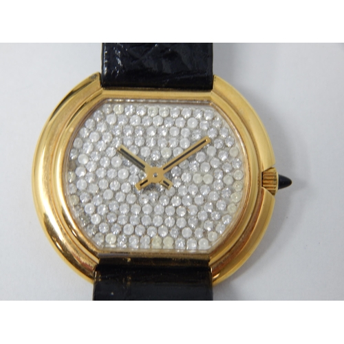 188 - Ladies 18k Gold Plated Stone Set Wristwatch with on Black Leather Strap.