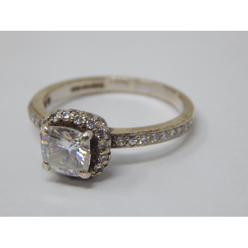 189 - 9ct White Gold Ring Set with a Central Moissanite 1.0ct with Moissanite Border & Shoulders: Size L/M... 