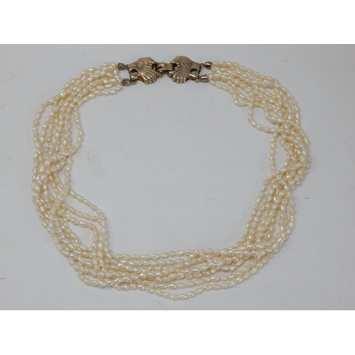 190 - 8 Strand Freshwater Pearl Necklace with Silver Clasp formed as an Oyster: Length 44cm