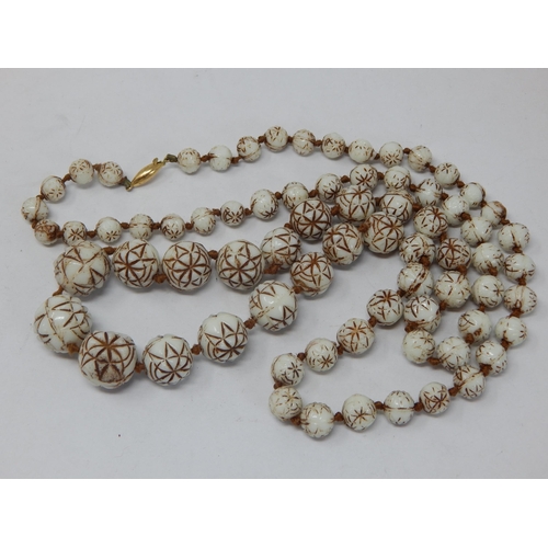 191 - 9ct Gold Clasped Bead Necklace: Length 84cm