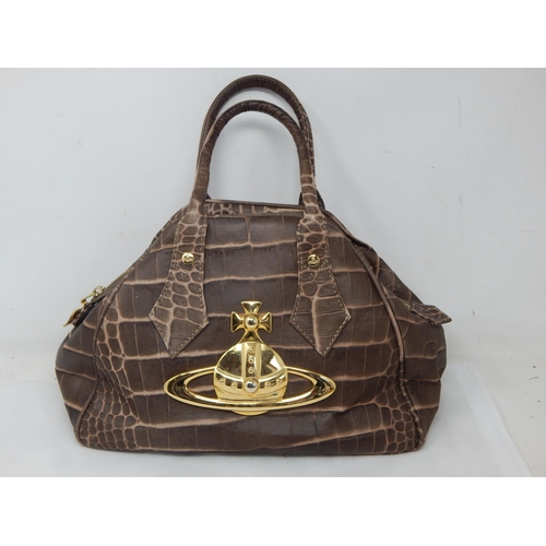 303 - VIVIENNE WESTWOOD, LONDON: Leather Handbag with Gold Coloured Orb to Front, Twin Handled with Zipped... 