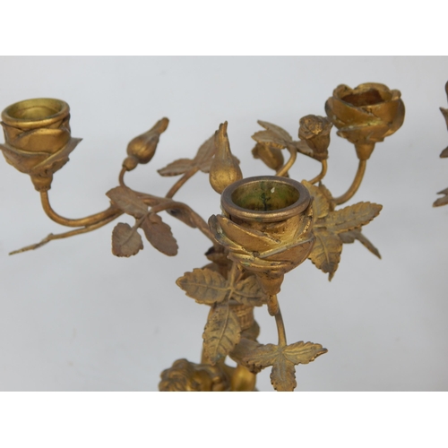 332 - A Pair of 19th Century French Ormolu Bronze Candelabra with Winged Putti each holding aloft a vase c... 