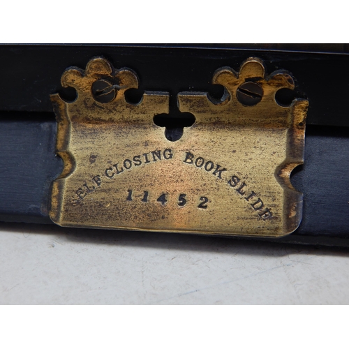 333 - Victorian Gothic Coromandel Self Closing Book Slide with brass riveted strap work set with polished ... 