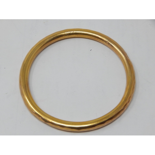 248 - 9ct Gold Hollow Bangle: Weight 8.8g