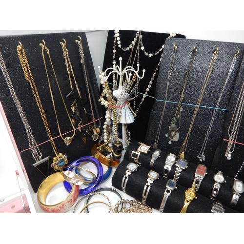 273 - A Large Collection of Costume Jewellery Including Pendant Necklaces, Chains, Bracelets, Bangles, Ear... 