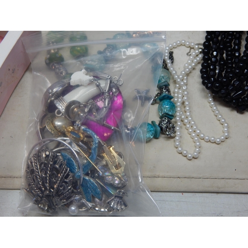 273 - A Large Collection of Costume Jewellery Including Pendant Necklaces, Chains, Bracelets, Bangles, Ear... 