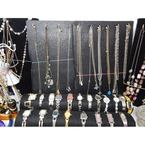 273 - A Large Collection of Costume Jewellery Including Pendant Necklaces, Chains, Bracelets, Bangles, Ear... 