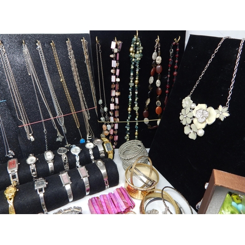 273 - A Large Collection of Costume Jewellery Including Pendant Necklaces, Chains, Bracelets, Bangles, Ear... 