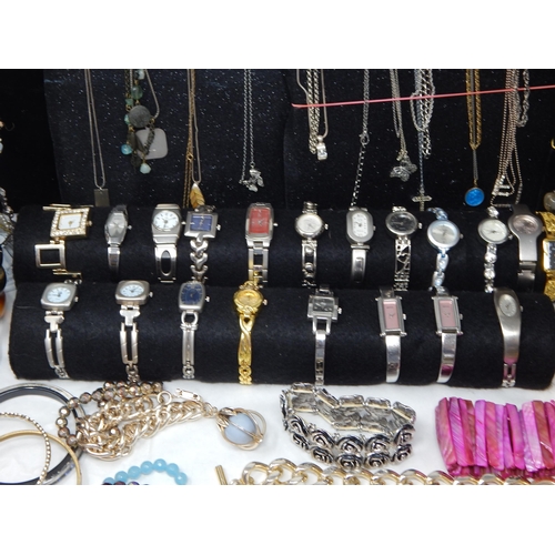 273 - A Large Collection of Costume Jewellery Including Pendant Necklaces, Chains, Bracelets, Bangles, Ear... 