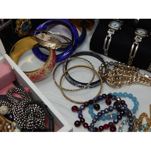 273 - A Large Collection of Costume Jewellery Including Pendant Necklaces, Chains, Bracelets, Bangles, Ear... 