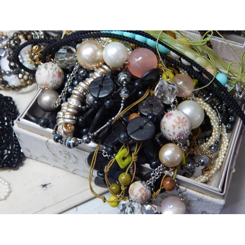 273 - A Large Collection of Costume Jewellery Including Pendant Necklaces, Chains, Bracelets, Bangles, Ear... 