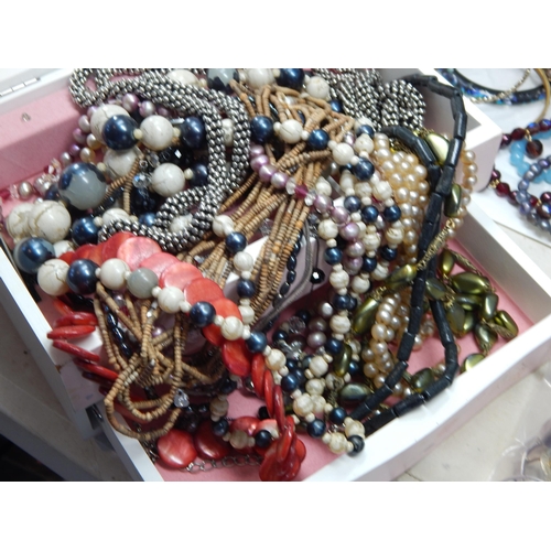 273 - A Large Collection of Costume Jewellery Including Pendant Necklaces, Chains, Bracelets, Bangles, Ear... 