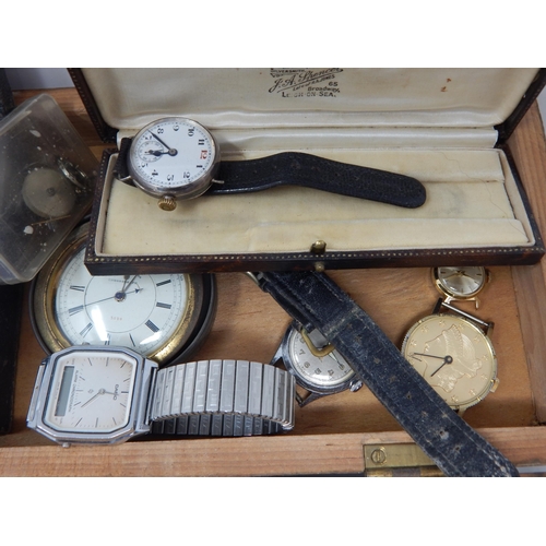 275 - A Wooden Box Containing a Large Quantity of Wristwatches, Movements, Parts etc: From a Watch Repaire... 