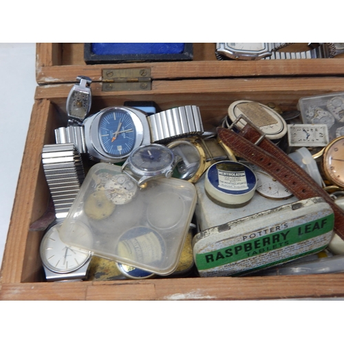 275 - A Wooden Box Containing a Large Quantity of Wristwatches, Movements, Parts etc: From a Watch Repaire... 