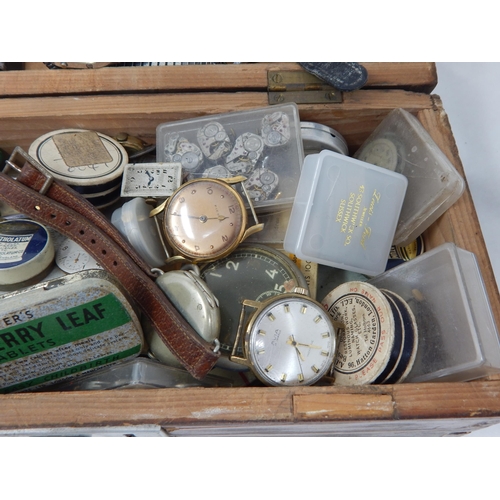 275 - A Wooden Box Containing a Large Quantity of Wristwatches, Movements, Parts etc: From a Watch Repaire... 