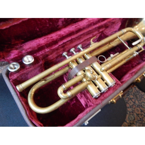 382 - Melody Maker Brass trumpet with Mouthpieces in Fitted Case together with a case of Trumpet Music She... 