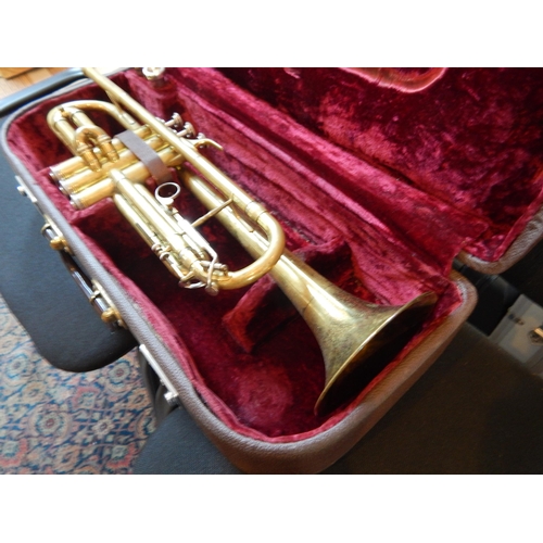 382 - Melody Maker Brass trumpet with Mouthpieces in Fitted Case together with a case of Trumpet Music She... 