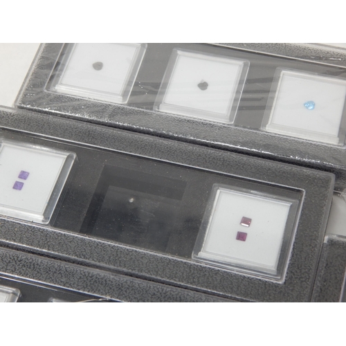 394 - A Collection of Semi Precious Gem Stones in Collectors Cases (23)