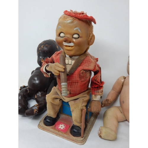 395 - Automaton of a Man Smoking a Cigar together with two vintage dolls A/F