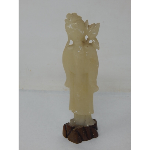 402 - Oriental Jade, Jadeite Figure of a Deity on Carved Wooden Base: 17.5cm High